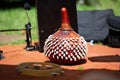 SHekere authentic african instrument outdoor shaker at day Royalty Free Stock Photo