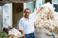 SHEKI, AZERBAIJAN - 20 July 2015: portrait of male seller sheep's wool looking at camera Royalty Free Stock Photo