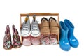 Shelf of children shoes for all seasons isolated Royalty Free Stock Photo