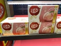 Tokyo, Japan - March 30, 2020: Shelf display with Tokyo Peach Kit Kats candy bars on sale, in a gift box at a gift shop
