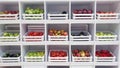 shelf with fruits and vegetables boxes green red