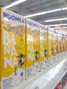 Shelf full of banana milk carton