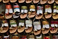 Shelf of leather hand made colorful Pakistani sandal shoes s Karachi Pakistan Royalty Free Stock Photo