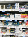 Shelf of Pain Relievers at a Grocery Store Royalty Free Stock Photo