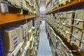 Shelf racks with boxes in storage warehouse, the interior space.