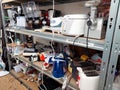 Shelf with second-hand appliances inside a store Royalty Free Stock Photo