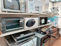 Shelf with second-hand appliances inside a store Royalty Free Stock Photo