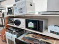 Shelf with second-hand appliances inside a store Royalty Free Stock Photo