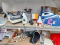 Shelf with second-hand appliances inside a store Royalty Free Stock Photo