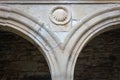 Shell on ancient catholic church. Pilgrimage symbol on cathedral wall. Detail of church on Camino de Santiago. Royalty Free Stock Photo