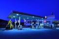 A Shell gas station at dusk