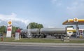 Shell Gas station getting deliver gasoline on a double semi truck cargo. A British