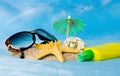 Shell, glasses, starfish and sun lotion