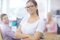 Shell lead her team to success. Portrait of an attractive young brunette businesswoman with her colleagues in the Royalty Free Stock Photo