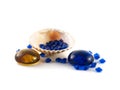 Shell on white background with blue crystals Royalty Free Stock Photo