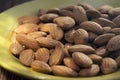 Shelled almonds Prunus dulcis, Prunus amygdalus on a plate. Closeup view Royalty Free Stock Photo