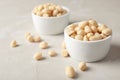Shelled peanuts in bowl on tabl Royalty Free Stock Photo