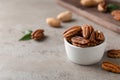 Shelled pecan nuts in bowl on table Royalty Free Stock Photo