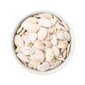 Shelled pumpkin seeds in a bowl isolated over white background Royalty Free Stock Photo