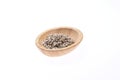 Shelled sunflower seeds on a wooden bowl against a white background. Food. Spices Royalty Free Stock Photo