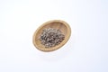 Shelled sunflower seeds on a wooden bowl against a white background. Food. Spices Royalty Free Stock Photo