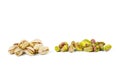 Shelled and unshelled pistachios isolated on white background Royalty Free Stock Photo