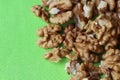 Shelled Walnuts on Bright Green Royalty Free Stock Photo