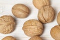 Shelled walnuts isolated wooden background Royalty Free Stock Photo
