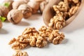 Shelled walnuts on white table Royalty Free Stock Photo