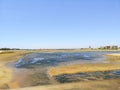 Shellfish area next to isla cristina beach, Costa de la Luz, Huelva, Spain. Cantil beach in the background