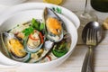 Shellfish mussels in cream sauce with white wine and chili pepper. Royalty Free Stock Photo