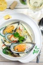 Shellfish mussels in cream sauce with white wine and chili pepper. Royalty Free Stock Photo