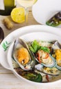 Shellfish mussels in cream sauce with white wine and chili pepper. Royalty Free Stock Photo