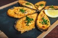 Shellfish mussels with herbs and lemon on the cutting board