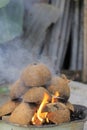 The shells being burned in the morning in the yard.