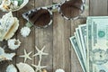 Shells, sunglasses and the U.S. dollar Royalty Free Stock Photo