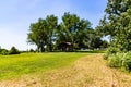 Shelter in a park with a cyclist on the trail Ed Zorinsky lake park