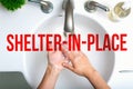 Shelter in place theme with person washing their hands