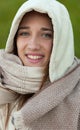 Sheltered girl with hood and scarf