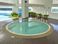 Sheltered round jacuzzi pool with sea view Royalty Free Stock Photo