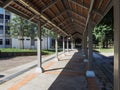 Sheltered walkway in a residential neighbourhood on a hot sunny day