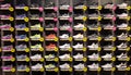 Shelves with different types of sneakers with big discounts on sale