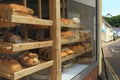 Shelves filled with freshly baked loaves of bread