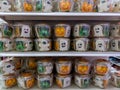 Shelves full of containers of decorated sugar cookies for Halloween, at a Target store