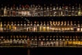 shelves with illuminated drinks bottles