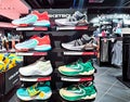 Shelves of Nike sneakers and sport wears with discounts on sale in the shopping mall