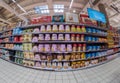 Shelves with packs of panettone and pandoro Christmas cakes in Conad supermarket Royalty Free Stock Photo