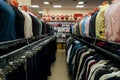 Shelves and racks with trousers, shirts and t-shirts, women underwear Royalty Free Stock Photo