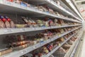 Shelves with sausage and smoked meat products in a large supermarket. Big choice. Blurred Royalty Free Stock Photo