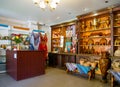 Shelves with souvenirs in the shop-museum `Russian Fantasy`